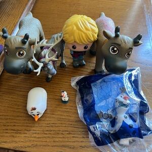 Disney Frozen figures Sven , Kristoff, and Olaf